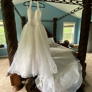 Wedding dress with halter style straps.
